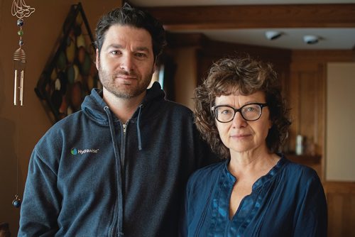 Canstar Community News Jan. 16 - Wayne Deschouwer's son marc and wife Clemence in the family's Charleswood home. (EVA WASNEY/CANSTAR COMMUNITY NEWS/METRO)