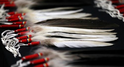 PHIL HOSSACK / WINNIPEG FREE PRESS - Eagle Feathers grace a table at "D" Division Tuesday waiting for ceremony preparing them to be placed in Detachments across Manitoba. Alex Paul story. - January 7, 2019.