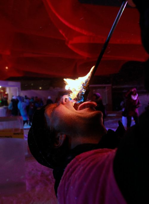 PHIL HOSSACK / WINNIPEG FREE PRESS - Chris without a hat prefers his beverages hot as he entertained at the opening night of the Ice Bar on the Red River Wednesday. See story. January 23, 2019