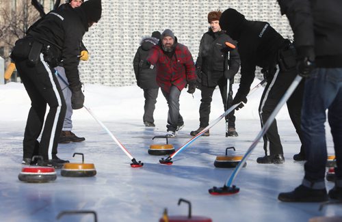 RUTH BONNEVILLE / WINNIPEG FREE PRESS

Local, Exchange curling rink

The Exchange District BIZ opens its popular  rink in Old Market Square with Mayor Brian Bowman, board members of the Biz and players on the Canadian Junior Curling team, over the lunch hour onThursday.   

Photo of Exchange District business owner Nick Van Seggelen (Bodegoes), throwing his rock during a fun curling bonspiel Thursday.  

January 24th, 2019
