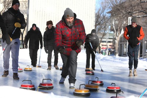RUTH BONNEVILLE / WINNIPEG FREE PRESS

Local, Exchange curling rink

The Exchange District BIZ opens its popular  rink in Old Market Square with Mayor Brian Bowman, board members of the Biz and players on the Canadian Junior Curling team, over the lunch hour onThursday.   

Photo of Exchange District business owner Nick Van Seggelen (Bodegoes), celebrating his positioning of his rock during a fun curling bonspiel Thursday.  

January 24th, 2019

