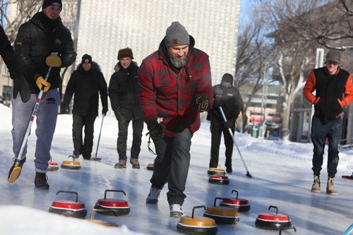 RUTH BONNEVILLE / WINNIPEG FREE PRESS

Local, Exchange curling rink

The Exchange District BIZ opens its popular  rink in Old Market Square with Mayor Brian Bowman, board members of the Biz and players on the Canadian Junior Curling team, over the lunch hour onThursday.   

Photo of Exchange District business owner Nick Van Seggelen (Bodegoes), celebrating his positioning of his rock during a fun curling bonspiel Thursday.  

January 24th, 2019
