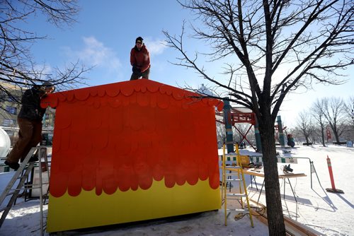 TREVOR HAGAN / WINNIPEG FREE PRESS
Chris Pancoe on top of Huttie, a warming hut he designed alongisde fellow Winnipeger, Jennie O'Keefe, at The Forks, Friday, January 25, 2019.