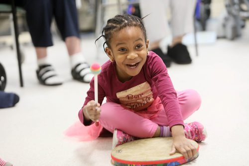 RUTH BONNEVILLE / WINNIPEG FREE PRESS

Sunday Special, Feature on  - Seniors and kids music class. 

Photo of Firdaus (4yrs) as she drums during interactive music class.

Daycare kids (ages 3 & 4), from Prairie Children's Centre, and residents of Pembina Place Personal Care Home, both located at the Deaf Centre Manitoba on Pembina,  meet weekly for 30 minute music class.  

Music teacher and chaplain, Michele Barr,
leads kids into playing bells and drums and other percussion instruments, as well as dancing with ribbons and scarfs during interactive music class Friday.  The children take part in the class in the centre as the adults from the centre watch and participate.

See Brenda Suderman's story. Story to run on a Sunday, Feb 4th. 

January 18th, 2019
