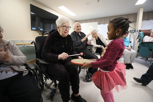 RUTH BONNEVILLE / WINNIPEG FREE PRESS

Sunday Special, Feature on  - Seniors and kids music class. 

Photo of Firdaus (4yrs) as she drums with resident, Rose Manning during interactive music class.

Daycare kids (ages 3 & 4), from Prairie Children's Centre, and residents of Pembina Place Personal Care Home, both located at the Deaf Centre Manitoba on Pembina,  meet weekly for 30 minute music class.  

Music teacher and chaplain, Michele Barr,
leads kids into playing bells and drums and other percussion instruments, as well as dancing with ribbons and scarfs during interactive music class Friday.  The children take part in the class in the centre as the adults from the centre watch and participate.

See Brenda Suderman's story. Story to run on a Sunday, Feb 4th. 

January 18th, 2019
