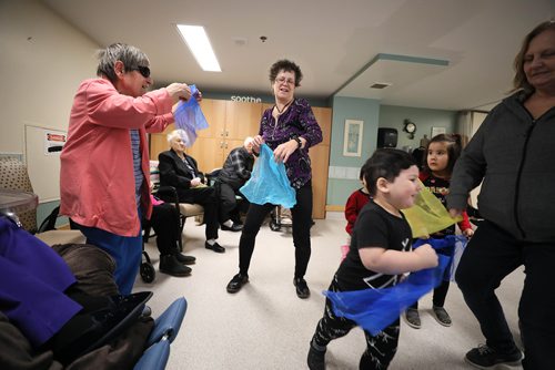 RUTH BONNEVILLE / WINNIPEG FREE PRESS

Sunday Special, Feature on  - Seniors and kids music class. 

Photo of Music teacher and chaplain, Michele Barr (centre), as she leads the kids and residents into dance moves while using a sheer scarf. Friday.  

Daycare kids (ages 3 & 4), from Prairie Children's Centre, and residents of Pembina Place Personal Care Home, both located at the Deaf Centre Manitoba on Pembina,  meet weekly for 30 minute music class.  

Music teacher and chaplain, Michele Barr,
leads kids into playing bells and drums and other percussion instruments, as well as dancing with ribbons and scarfs during interactive music class Friday.  The children take part in the class in the centre as the adults from the centre watch and participate.


See Brenda Suderman's story. Story to run on a Sunday, Feb 4th. 

January 18th, 2019
