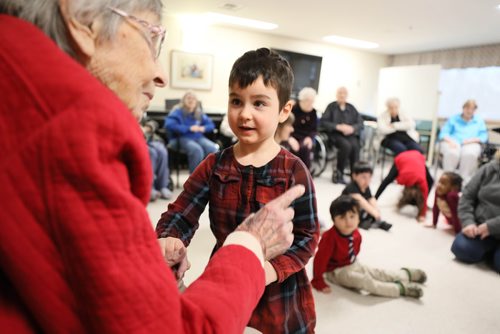 RUTH BONNEVILLE / WINNIPEG FREE PRESS

Sunday Special, Feature on  - Seniors and kids music class. 

Photo of Hela (4yrs) as she holds the hands of  resident, Anna Andres,  during class.  

Daycare kids (ages 3 & 4), from Prairie Children's Centre, and residents of Pembina Place Personal Care Home, both located at the Deaf Centre Manitoba on Pembina,  meet weekly for 30 minute music class.  

Music teacher and chaplain, Michele Barr,
leads kids into playing bells and drums and other percussion instruments, as well as dancing with ribbons and scarfs during interactive music class Friday.  The children take part in the class in the centre as the adults from the centre watch and participate.

See Brenda Suderman's story. Story to run on a Sunday, Feb 4th. 

January 18th, 2019

