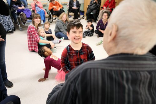 RUTH BONNEVILLE / WINNIPEG FREE PRESS

Sunday Special, Feature on  - Seniors and kids music class. 

Photo of Hela (4yrs) showing residents how she can dance during music class. 

Daycare kids (ages 3 & 4), from Prairie Children's Centre, and residents of Pembina Place Personal Care Home, both located at the Deaf Centre Manitoba on Pembina,  meet weekly for 30 minute music class.  

Music teacher and chaplain, Michele Barr,
leads kids into playing bells and drums and other percussion instruments, as well as dancing with ribbons and scarfs during interactive music class Friday.  The children take part in the class in the centre as the adults from the centre watch and participate.

See Brenda Suderman's story. Story to run on a Sunday, Feb 4th. 

January 18th, 2019
