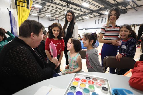 RUTH BONNEVILLE / WINNIPEG FREE PRESS

Story: The Newcomer Community Hub,  located inside Ryerson School, hosts its grand opening Saturday. 

Photo of kids getting their face painted  at grand opening for the Hub  Saturday.  

Pembina Trails School Division has recently welcomed an increasing number of refugees into its schools. In order to support the community, with a current focus on Yazidi refugees, a unique relationship has been created with Immigration Partnership Winnipeg, the Manitoba Association of Newcomer Serving Organizations and a number of other groups called, The Newcomer Community Hub.   It is located in Ryerson School in Pembina Trails School Division and is a one-stop shop of services that traditionally have been located in the citys downtown.   The Newcomer Community Hub held its formal grand opening with food, activities for kids and ribbon cutting ceremony.  

See Solomon's story. 
 
January 26th,  2019
