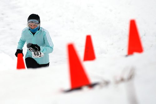 JOHN WOODS / WINNIPEG FREE PRESS
Marla Watt climbs a river bank as she comes off the Red River as part in the 6th annual Frostbite River Run, a fundraiser in support of programming and activities at Riverview Community Centre in WinnipegSunday, January 27, 2019. The Frostbite River Run is part of the Riverview Winter Classic - a series of outdoor events held in January at the community centre.