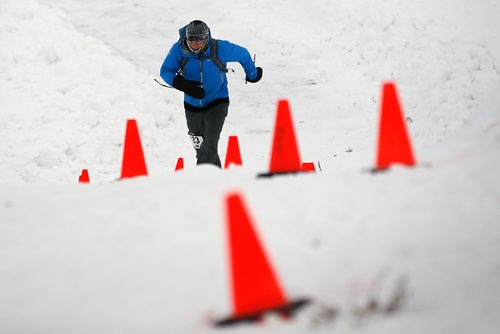 JOHN WOODS / WINNIPEG FREE PRESS
Fern Doucet climbs a river bank as he come off the Red River as part in the 6th annual Frostbite River Run, a fundraiser in support of programming and activities at Riverview Community Centre in WinnipegSunday, January 27, 2019. The Frostbite River Run is part of the Riverview Winter Classic - a series of outdoor events held in January at the community centre.