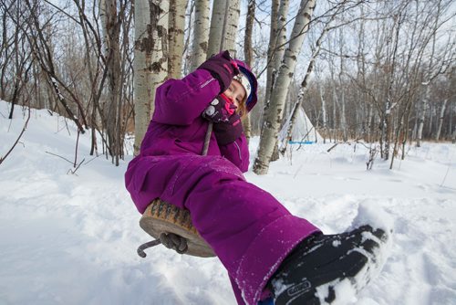 MIKE DEAL / WINNIPEG FREE PRESS
Tessa, 4, takes a turn on a rope swing during self-directed play outdoors Monday morning at the FortWhyte Alive Forest School.
A pre-school alternative where kids ages 3-5 spend the whole session outdoors in the woods, even in this cold weather. They are hardier than most adults! 
190128 - Monday, January 28, 2019.