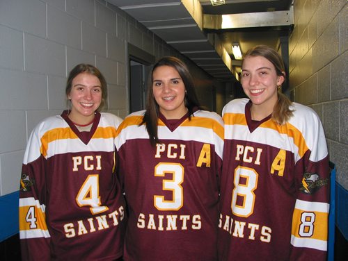 Canstar Community News Jan. 21, 2019 - (From left) Portage Collegiate Saints co-captains Paige and (right) Maddie Schwaluk with assistant captain Chelsea Owens are shown before a Jan. 21 game in which the Saints lost 3-2 to the Kelvin Clippers. (ANDREA GEARY/CANSTAR COMMUNITY NEWS)