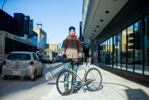 MIKAELA MACKENZIE / WINNIPEG FREE PRESS
Addie Prentice braves the cold while cycling downtown in Winnipeg on Wednesday, Jan. 30, 2019. 
Winnipeg Free Press 2018.