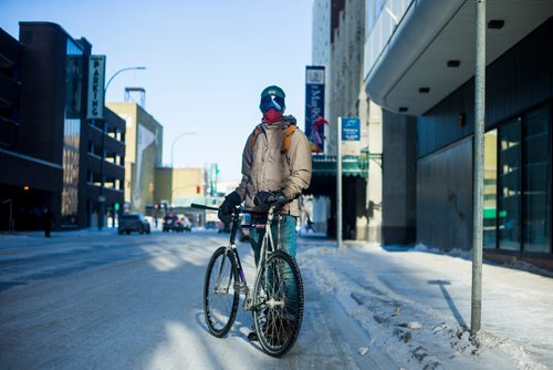 MIKAELA MACKENZIE / WINNIPEG FREE PRESS
Addie Prentice braves the cold while cycling downtown in Winnipeg on Wednesday, Jan. 30, 2019. 
Winnipeg Free Press 2018.