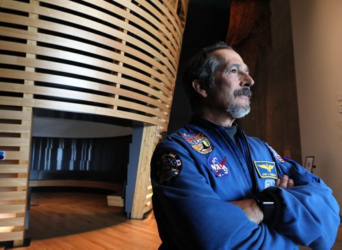 RUTH BONNEVILLE  /  WINNIPEG FREE PRESS

LOCAL - Indigenous Astronaut

Indigenous astronaut, Commander John Herrington  member of the Chickasaw Nation,  shares his experience in space with students at CMHR Thursday.

Photo of  Commander John Herrington in the Indigenous Perspectives gallery that he visited between talking to students on Thursday. 

More info:
Dr. Herrington spent 13 days, 18 hours and 47 minutes in space in 2002, taking his tribe's flag to the International Space Station. His sessions with students are supported by a partnership between the CMHR and Information and Communication Technologies Association Manitoba (ICTAM) as part of DisruptED, an annual conference presented by RBC Future Launch about the future of work and technology.


See Alex Paul story. 

January 31st,  2019
