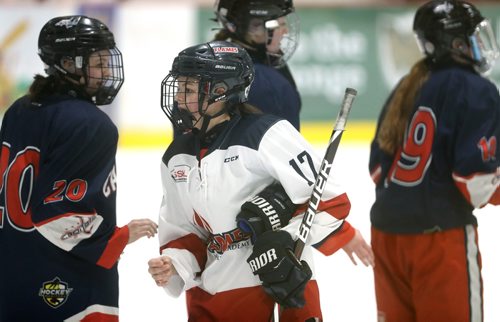 TREVOR HAGAN / WINNIPEG FREE PRESS
Sisters, Central Plains Capitals, Taylor Woodward, age 18 and St.Mary's Academy Flames' Alexis Woodward, age 15, right, and snubbing each other in the handshake line during the Female World Sport School Challenge hockey tournament at the Iceplex, Thursday, January 31, 2019. It was the first time they have played each other.