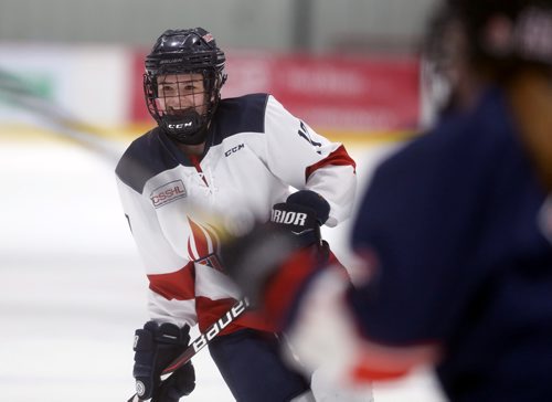 TREVOR HAGAN / WINNIPEG FREE PRESS
St.Mary's Academy Flames' Alexis Woodward, age 15, laughing after being slashed by her sister, Central Plains Capitals, Taylor Woodward, age 18, during the Female World Sport School Challenge hockey tournament at the Iceplex, Thursday, January 31, 2019. It was the first time they have played each other.