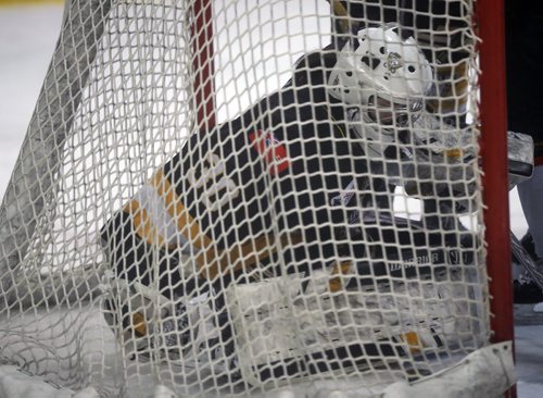 TREVOR HAGAN / WINNIPEG FREE PRESS
Pilot Mound Buffaloes goaltender Hana Bush is pushed into the net while playing against the Lloydminster PMW Steelers, during the Female World Sport School Challenge hockey tournament at the Iceplex, Thursday, January 31, 2019.