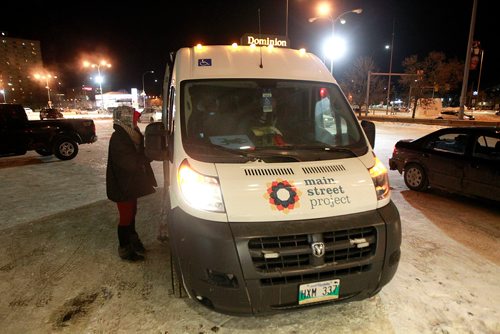 PHIL HOSSACK / WINNIPEG FREE PRESS - A woman living on the streets approaches the MSP Outreach van Thursday night. January 31, 2019