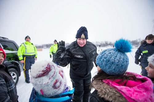 MIKAELA MACKENZIE / WINNIPEG FREE PRESS
RCMP commissioner Brenda Lucki  high-fives kids while visiting ice shacks on the Red River near Selkirk, Manitoba on Friday, Feb. 1, 2019.
Winnipeg Free Press 2018.