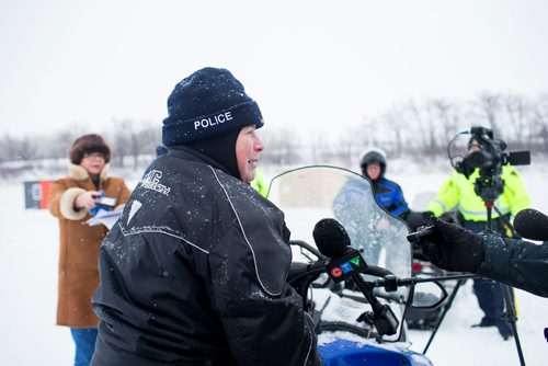 MIKAELA MACKENZIE / WINNIPEG FREE PRESS
RCMP commissioner Brenda Lucki speaks to the media on her snowmobile while visiting ice shacks on the Red River near Selkirk, Manitoba on Friday, Feb. 1, 2019.
Winnipeg Free Press 2018.