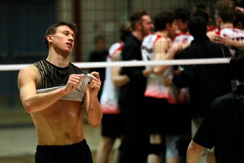 PHIL HOSSACK / WINNIPEG FREE PRESS - Manitoba Bison #12 pulls his shirt over his head in frustration after the Wesmen Men took the final in the Wesmen Classic Volleyball tournament Friday. 3 of 3 pics -February 1, 2019