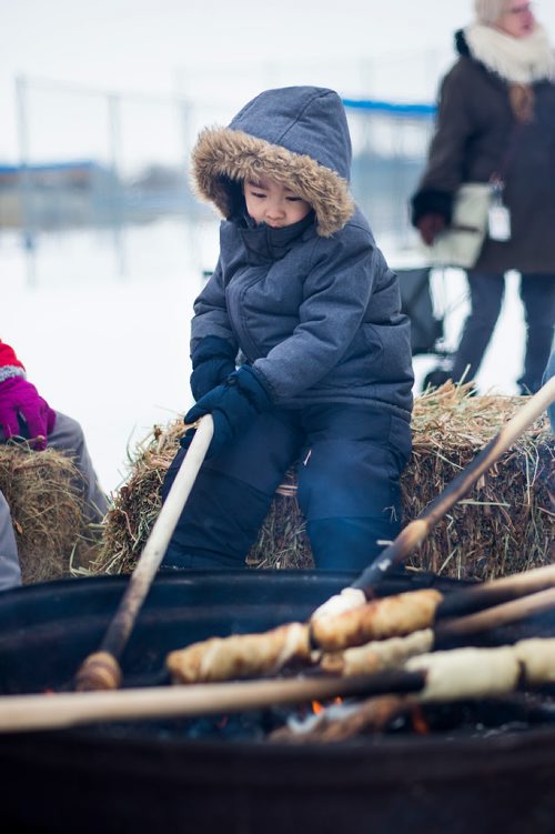 MIKAELA MACKENZIE / WINNIPEG FREE PRESS
Roy Zhou, five, roasts bannock over the fire at Heritage Day at the St. Norbert Community Centre in Winnipeg on Saturday, Feb. 2, 2019.
Winnipeg Free Press 2018.