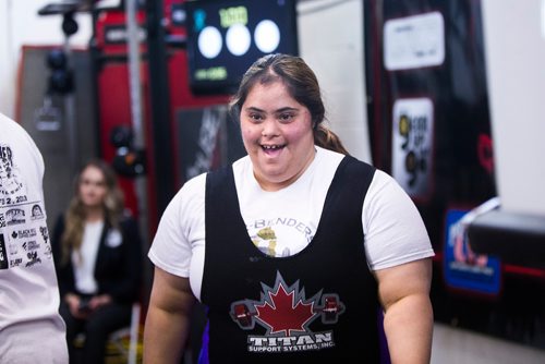 MIKAELA MACKENZIE / WINNIPEG FREE PRESS
Reetu Chahal, part of the Bar-Benders Special Olympics team, smiles after successfully doing her bench press at Brickhouse Gyms fourth annual powerlifting competition, Manitoba's largest powerlifting competition to date, in Winnipeg on Saturday, Feb. 2, 2019.
Winnipeg Free Press 2018.