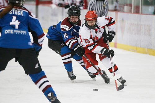 JOHN WOODS / WINNIPEG FREE PRESS
Winnipeg Avros' Taylor Coward (16) gets around Ancaster Avalanche's Alissa General (14) in first period of the bronze medal game at the Female World Sport School Challenge at Iceplex in Winnipeg Sunday, February 3, 2019.