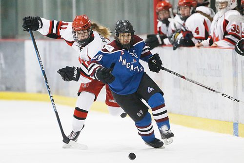 JOHN WOODS / WINNIPEG FREE PRESS
Winnipeg Avros' Janelle Keam-Perrault (11) works to get around Ancaster Avalanche's Michelle Goble (89) in first period of the bronze medal game at the Female World Sport School Challenge at Iceplex in Winnipeg Sunday, February 3, 2019.