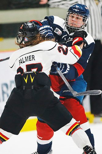 JOHN WOODS / WINNIPEG FREE PRESS
St Mary's Academy's Kennedy Frank (3) works to get around Lloydminster PMW Steelers' Brooklyn Palmer (27) in first period of the gold medal game at the Female World Sport School Challenge at Iceplex in Winnipeg Sunday, February 3, 2019.