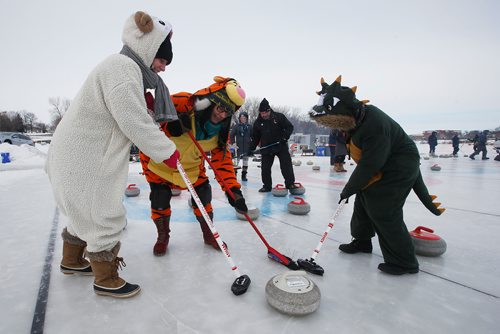 JOHN WOODS / WINNIPEG FREE PRESS
From left, Melissa, April and Kristina from the Winnipeg Roller Derby League braved the cold in costume to take part in the Ironman Outdoor Curling Classic on the Red River at The Forks in Winnipeg Sunday, February 3, 2019.