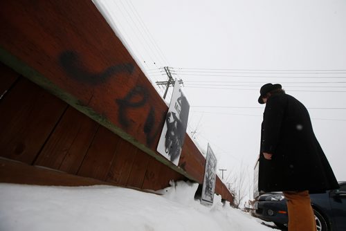 JOHN WOODS / WINNIPEG FREE PRESS
Maxim Berent, an owner of a Corydon Avenue cafe and who does not want to be identified in photograph, looks at anti-Semitic graffiti painted on his business in Winnipeg Sunday, February 3, 2019. This is the second time in the last month Berent has been a victim of anti-Semitic graffiti. The police are investigating the incident as a hate crime. Bermax Caffe