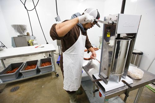 MIKE DEAL / WINNIPEG FREE PRESS
Lord Sale owner of Lolos Premium Meats a local manufacturer of Filipino-style sausages makes longganosa and chavacano sausages at a facility he rents near Beausejour.
190130 - Wednesday, January 30, 2019.