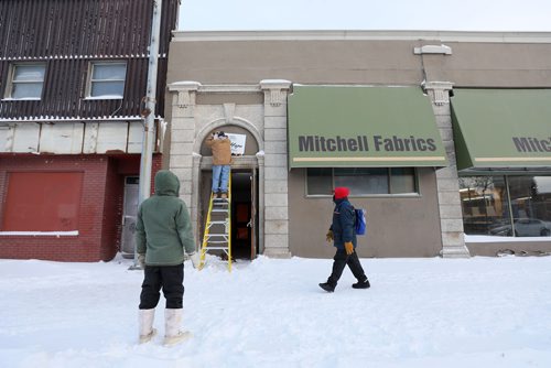 RUTH BONNEVILLE / WINNIPEG FREE PRESS


Steve Swiderski (contractor for MSP), hangs new sign outside of door on the old Mitchell Fabrics building on Main Street for Main Street Projects new warming centre called, New Hope Welcome Space Monday. 

See Kevin Rollason's story. 

Feb 04, 19
