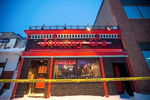 MIKAELA MACKENZIE / WINNIPEG FREE PRESS
Police tape and cruisers surround Johnny G's on Main St in Winnipeg on Wednesday, Feb. 6, 2019.
Winnipeg Free Press 2018.