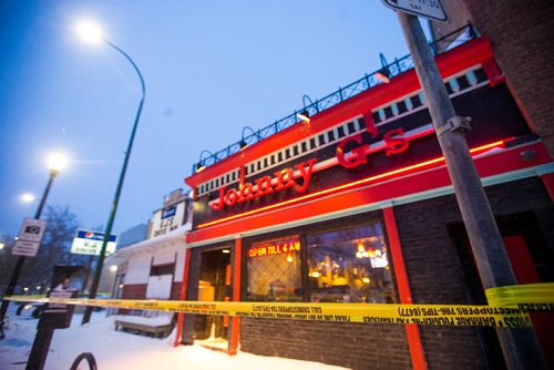 MIKAELA MACKENZIE / WINNIPEG FREE PRESS
Police tape and cruisers surround Johnny G's on Main St in Winnipeg on Wednesday, Feb. 6, 2019.
Winnipeg Free Press 2018.