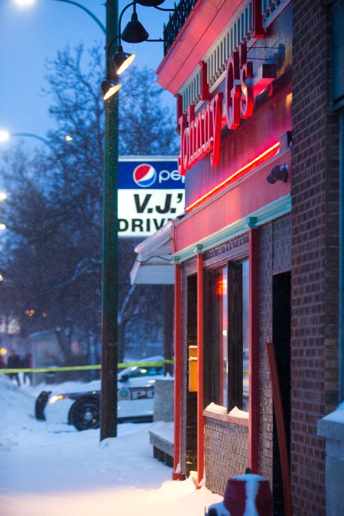 MIKAELA MACKENZIE / WINNIPEG FREE PRESS
Police tape and cruisers surround Johnny G's on Main St in Winnipeg on Wednesday, Feb. 6, 2019.
Winnipeg Free Press 2018.