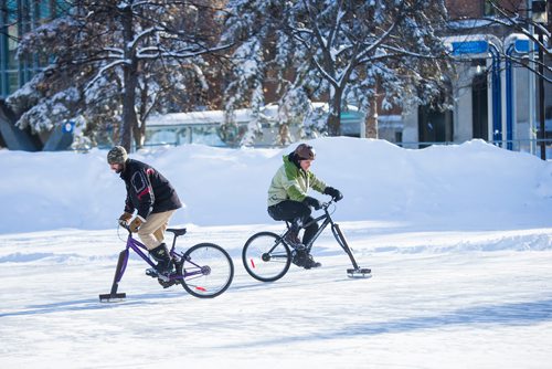 MIKAELA MACKENZIE / WINNIPEG FREE PRESS
Max Hughson (left), U of M student and volunteer at UMCycle, and Don Russell, U of M student, tries out the ice bikes (bikes retrofitted with blades on the front end) at the University of Manitoba in Winnipeg on Wednesday, Feb. 6, 2019. The bikes were made for the Big Bike Chill taking place later this month at the Forks, and the event was organized as part of the Jack Frost Challenge, which aims to get people outdoors and active in the deep freeze of winter.
Winnipeg Free Press 2019