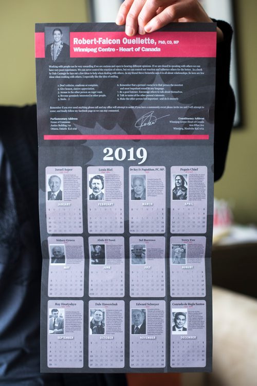 MIKAELA MACKENZIE / WINNIPEG FREE PRESS
English professor Heather Milne poses with the all-male "notable Canadians" calendar that liberal MP Robert-Falcon Ouellette sent out in Winnipeg on Wednesday, Feb. 6, 2019. 
Winnipeg Free Press 2019.