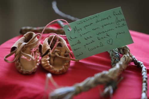 RUTH BONNEVILLE / WINNIPEG FREE PRESS

Photo handcrafted moccasins made by support groups for families trying to get their children back. 

Profile on Cora Morgan, Assembly of Manitoba Chiefs First Nations Family Advocate and services at the centre. 


Saturday special, In the wake of the explosive CFS Facebook video, which she helped shed light on. Profile piece on her role? What's her background? Why does the Assembly of Manitoba Chiefs have its own dedicated advocate?

Photos of Healing classes, children at office, indigenous cultural items and portraits of Morgan at AMC First Nations Family Advocate office Wednesday. 


See story by Jessica Botelho-Urbanski
Manitoba Legislature Reporter

Feb 6, 2019
