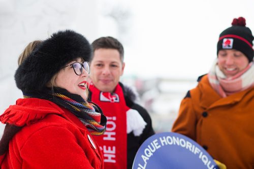 MIKAELA MACKENZIE / WINNIPEG FREE PRESS
Lynne Connelly, president of the Festival du Voyageur board of directors (left) speaks as Mayor Brian Bowman and Darrel Nadeau, executive director of the Festival du Voyageur, listen at an event to recognize the Festival du Voyageurs 50th anniversary with an honourary street naming of St. Joseph St. in Winnipeg on Thursday, Feb. 7, 2019. 
Winnipeg Free Press 2019.