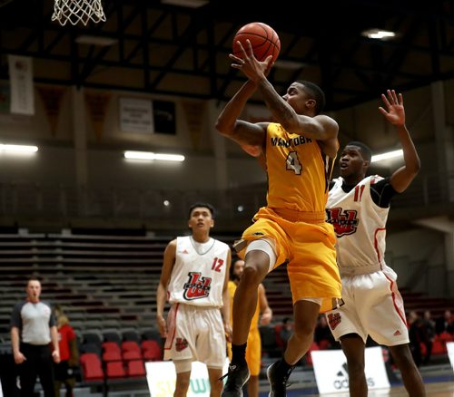 TREVOR HAGAN / WINNIPEG FREE PRESS 
Manitoba Bisons' guard Rashawn Browne (4) versus the Winnipeg Wesmen during a single game elimination, Wednesday, February 6, 2019.