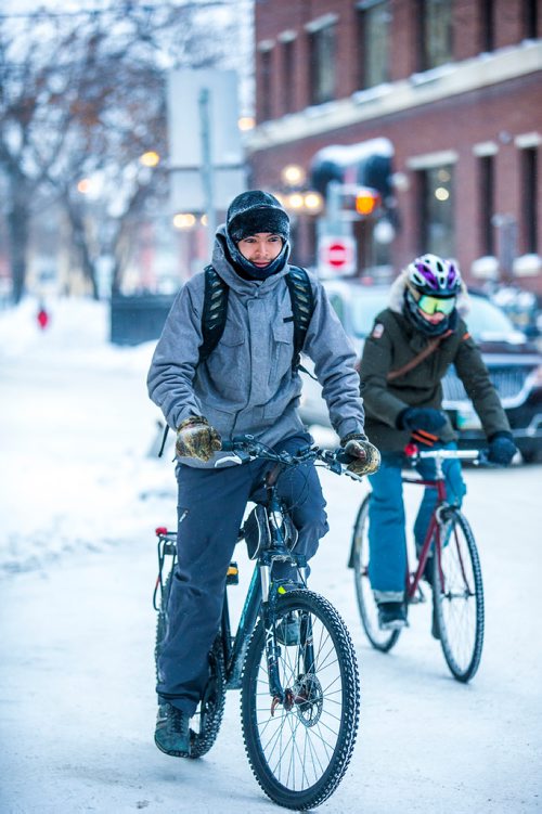 MIKAELA MACKENZIE / WINNIPEG FREE PRESS
Jordan H. bikes to work on Bannatyne avenue in Winnipeg on Friday, Feb. 8, 2019.
Winnipeg Free Press 2019.