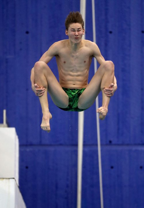 TREVOR HAGAN / WINNIPEG FREE PRESS
Bjorn Markentin from the Regina Diving Club, diving from the 3m board at Pan Am Pool during the 2010 Polar Bear Classic, Friday, February 8, 2019.