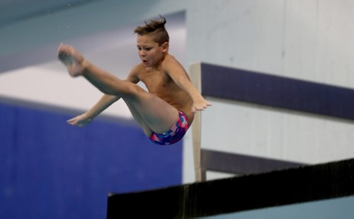 TREVOR HAGAN / WINNIPEG FREE PRESS
Lukas Knakoske diving from the 5m platform at Pan Am Pool during the 2010 Polar Bear Classic, Friday, February 8, 2019.