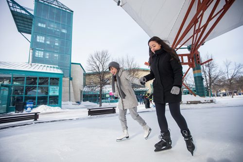 MIKAELA MACKENZIE / WINNIPEG FREE PRESS
Red River College international students Helen Du (left) and Renata Cavalcanti, from Vietnam and Brazil, hold hands for balance as they skate at the Forks in Winnipeg on Saturday, Feb. 9, 2019.
Winnipeg Free Press 2019.