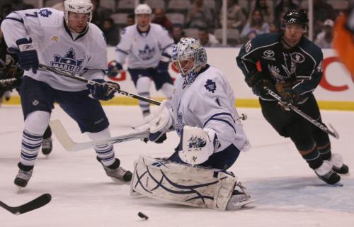 Toronto Marlies goaltender Justin Pogge makes a save as the Manitoba Moose's Michael Grabner looks for a rebound before the Marlies defenceman Todd Perry finds the puck during the first period of AHL playoff action at the Ricoh Centre in Toronto, ON Sunday, April 19, 2009. Darren Calabrese for The Winnipeg Free Press