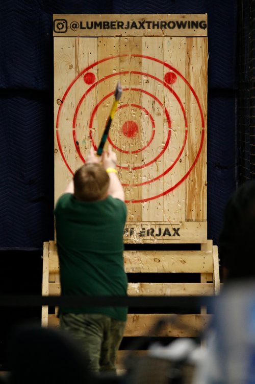 JOHN WOODS / WINNIPEG FREE PRESS
Nine year old Madden Touchette throws an axe during the Manitoba Outdoors Show at Red River Exhibition Place in Winnipeg Sunday, February 10, 2019.